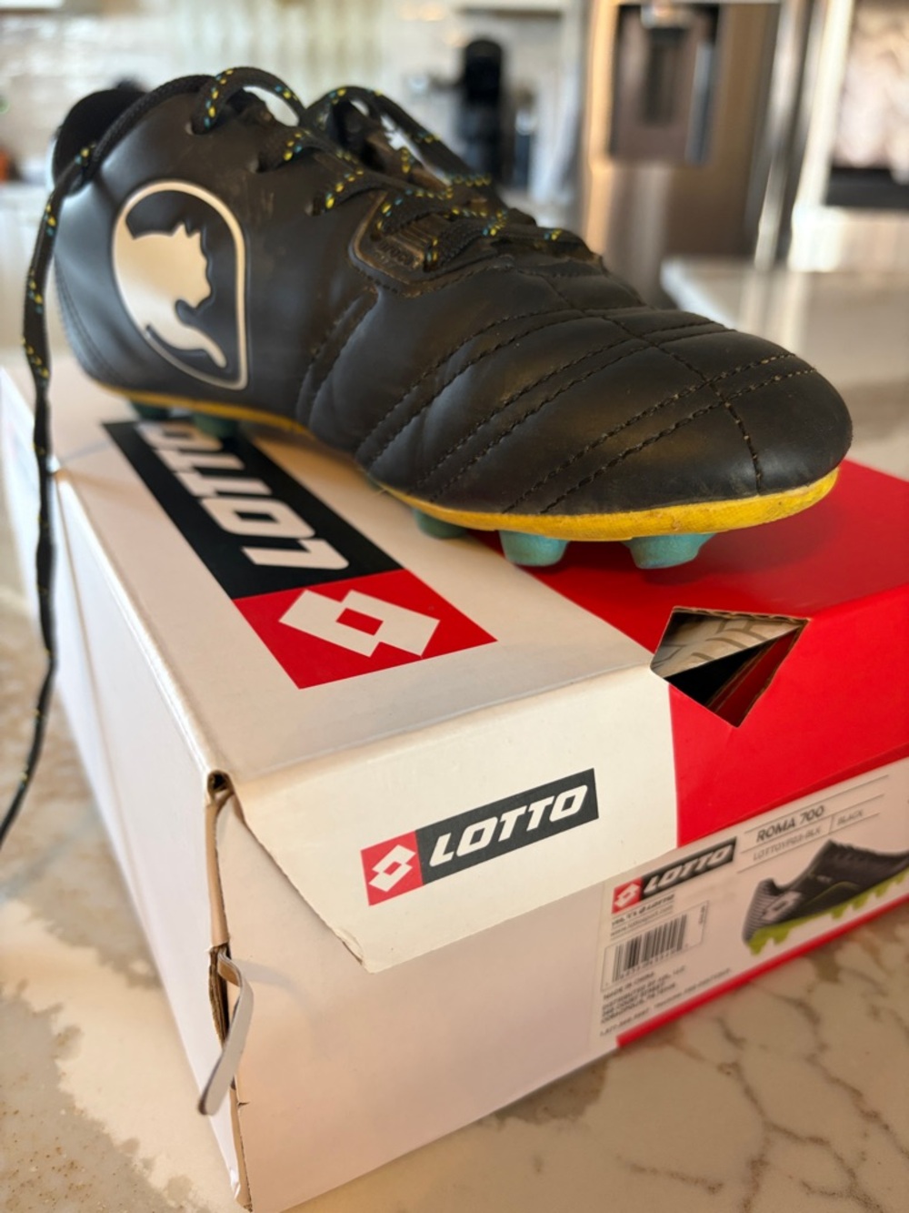LOTTO Boys Black Cleats with Yellow and Teal Accents